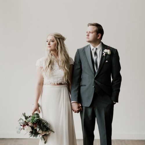 bride and groom holding hands by Dayton Ohio Wedding Photographer Josh Ohms