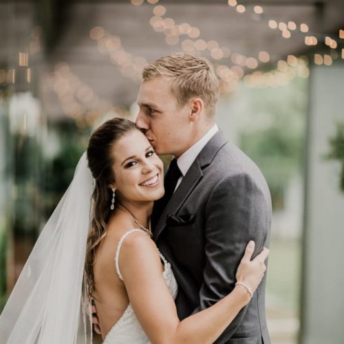 groom kissing bride on forehead by Dayton Ohio Wedding Photographer Josh Ohms