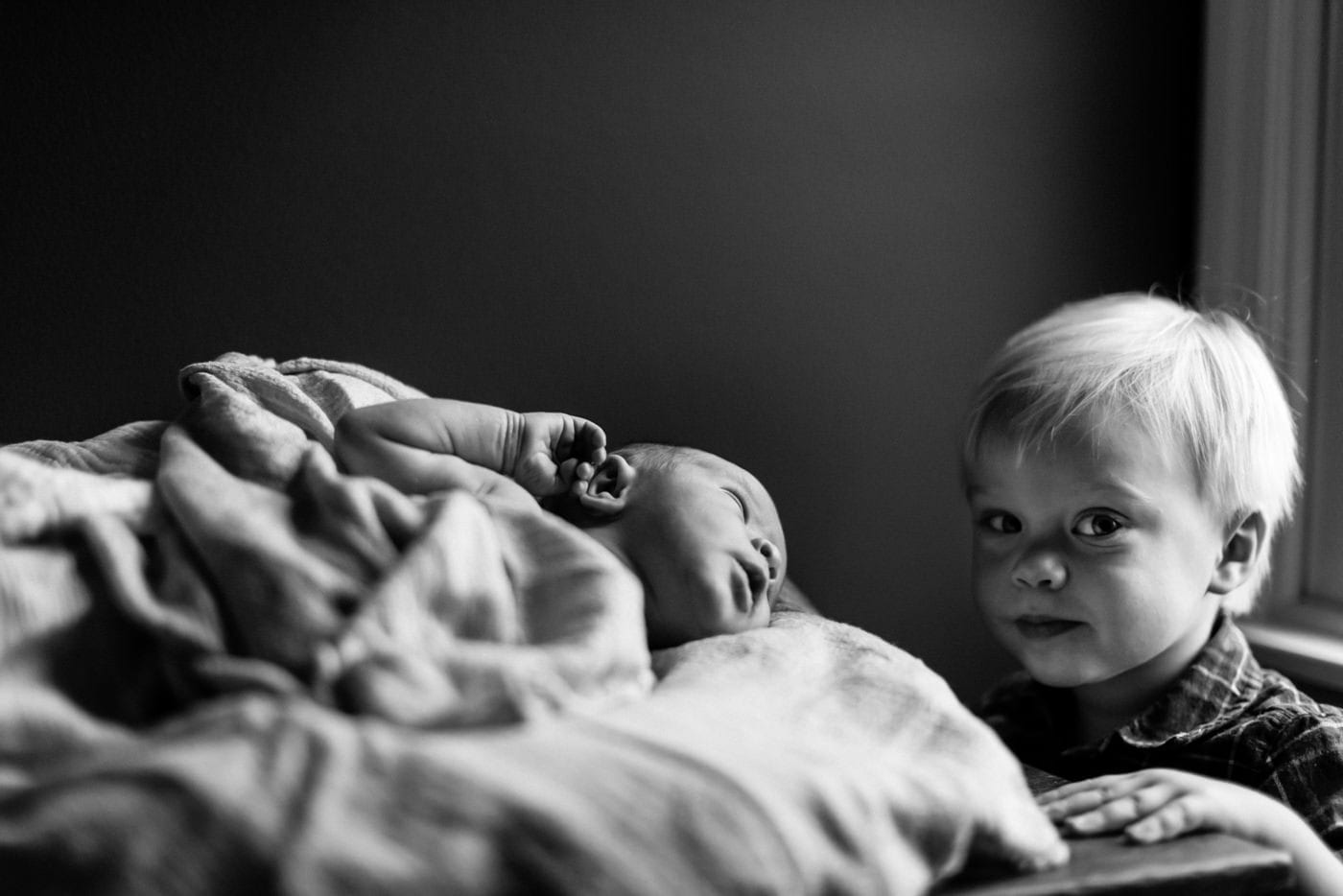 big brother watches baby brother - in-home newborn session