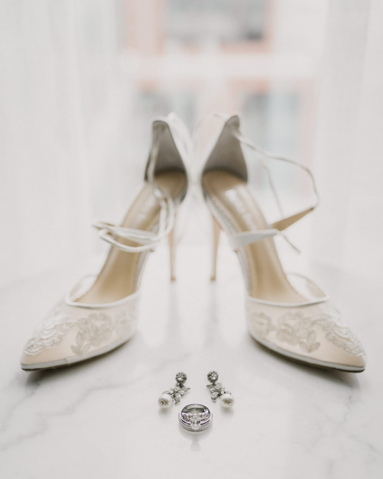 wedding shoes and rings at Franklin Park Conservatory Wedding by Columbus Wedding Photographer