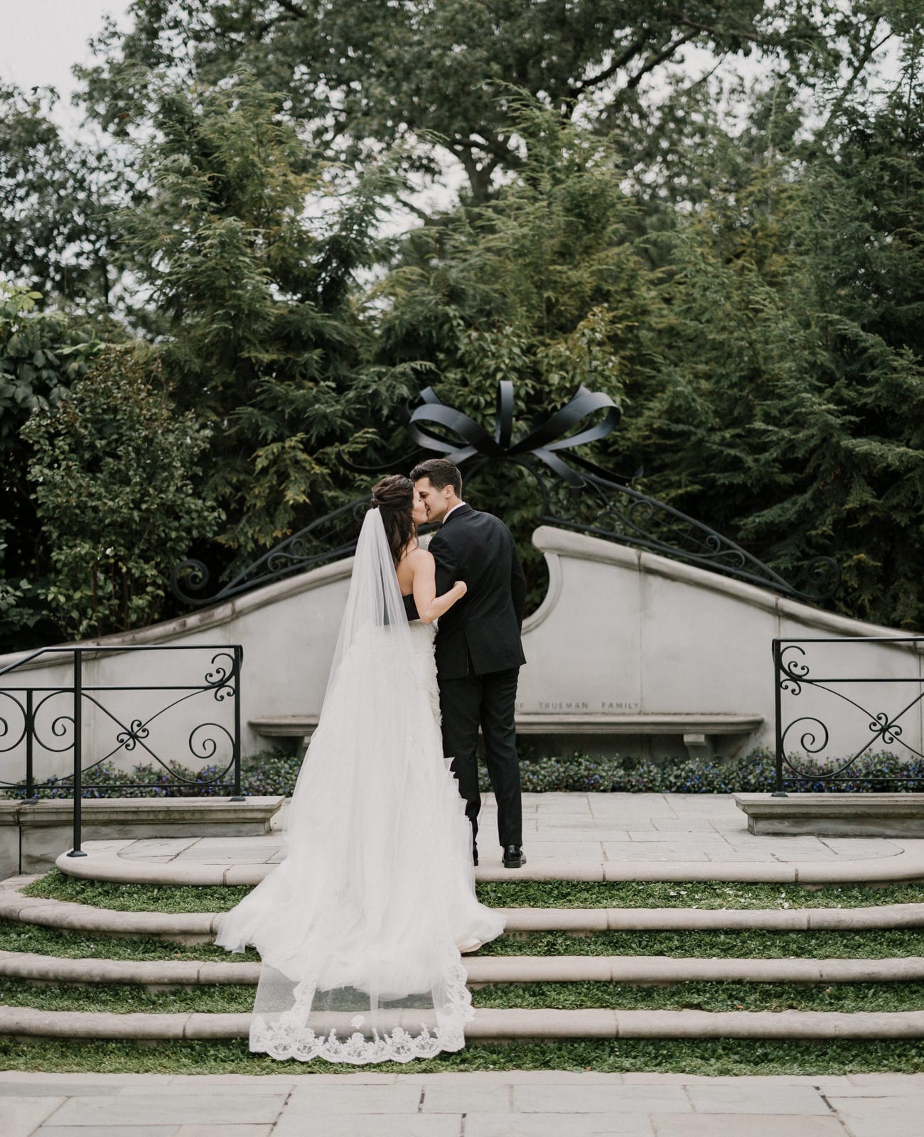 bride and groom kiss at Franklin Park Conservatory Wedding by Columbus Wedding Photographer
