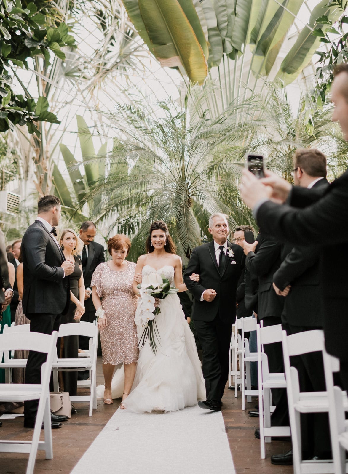 bride walking down the aisle at Franklin Park Conservatory Wedding by Columbus Wedding Photographer