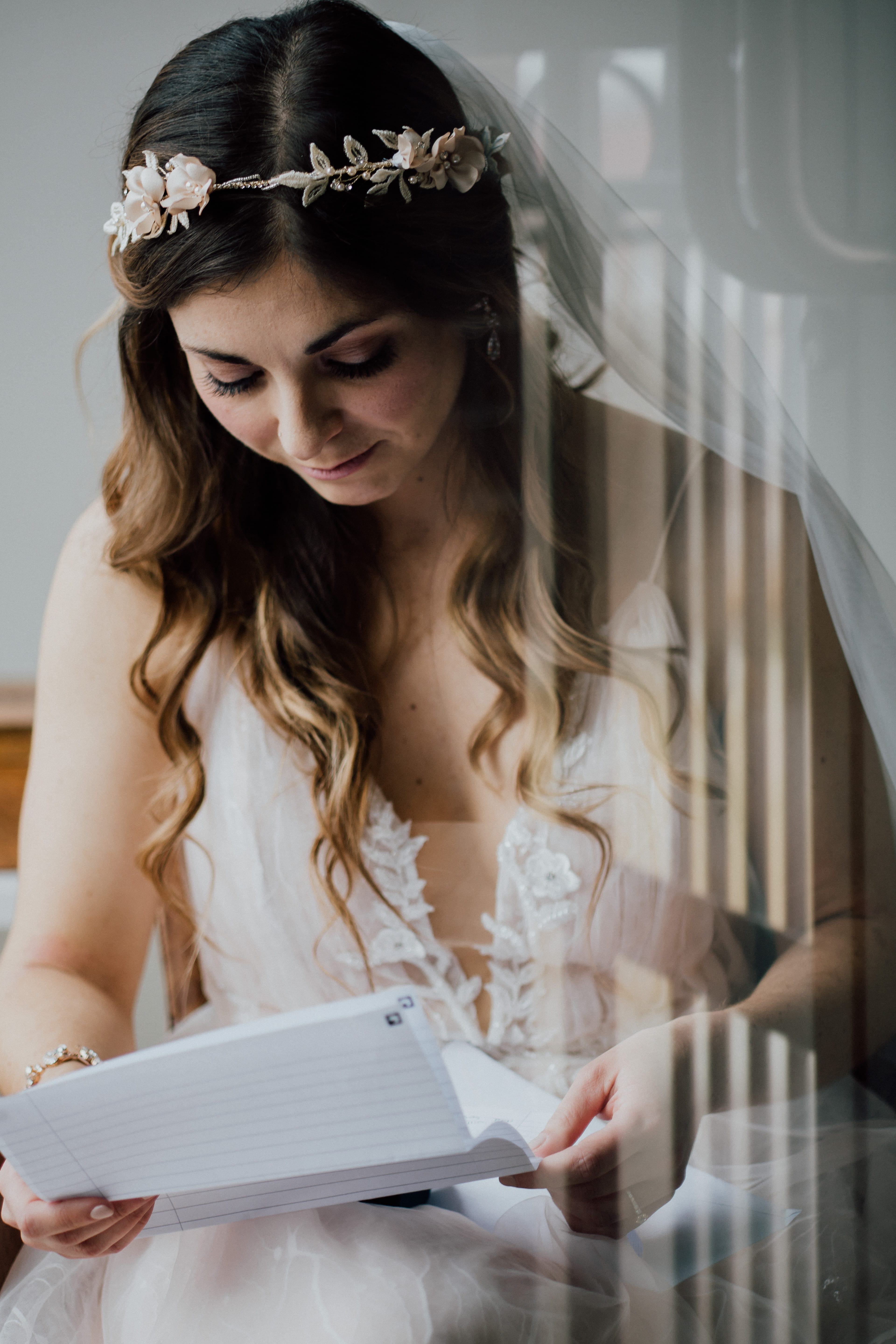 Bride reads note from groom