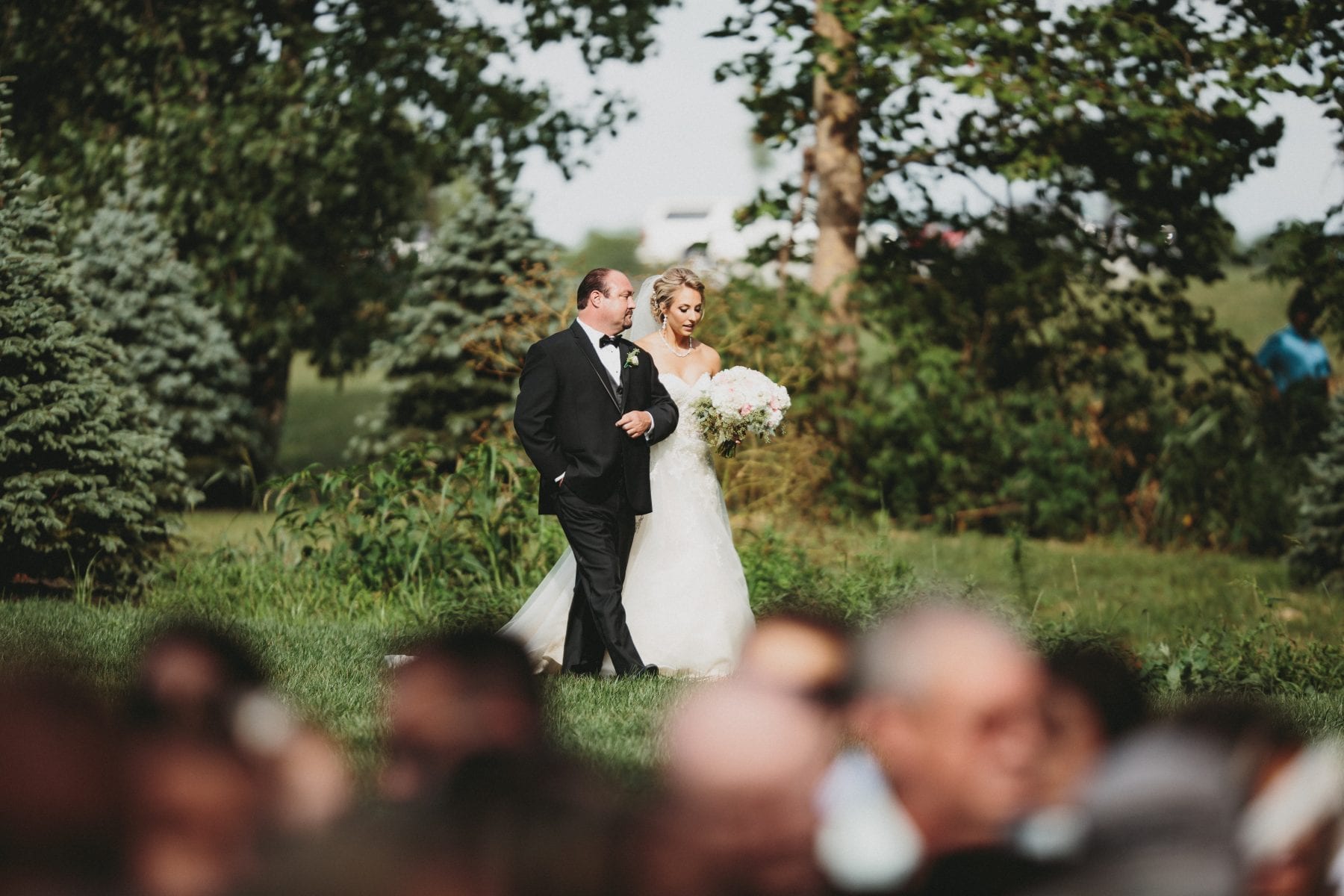 bride walks down the aisle at Rolling Meadows Ranch Wedding - Cincinnati Wedding Photographer