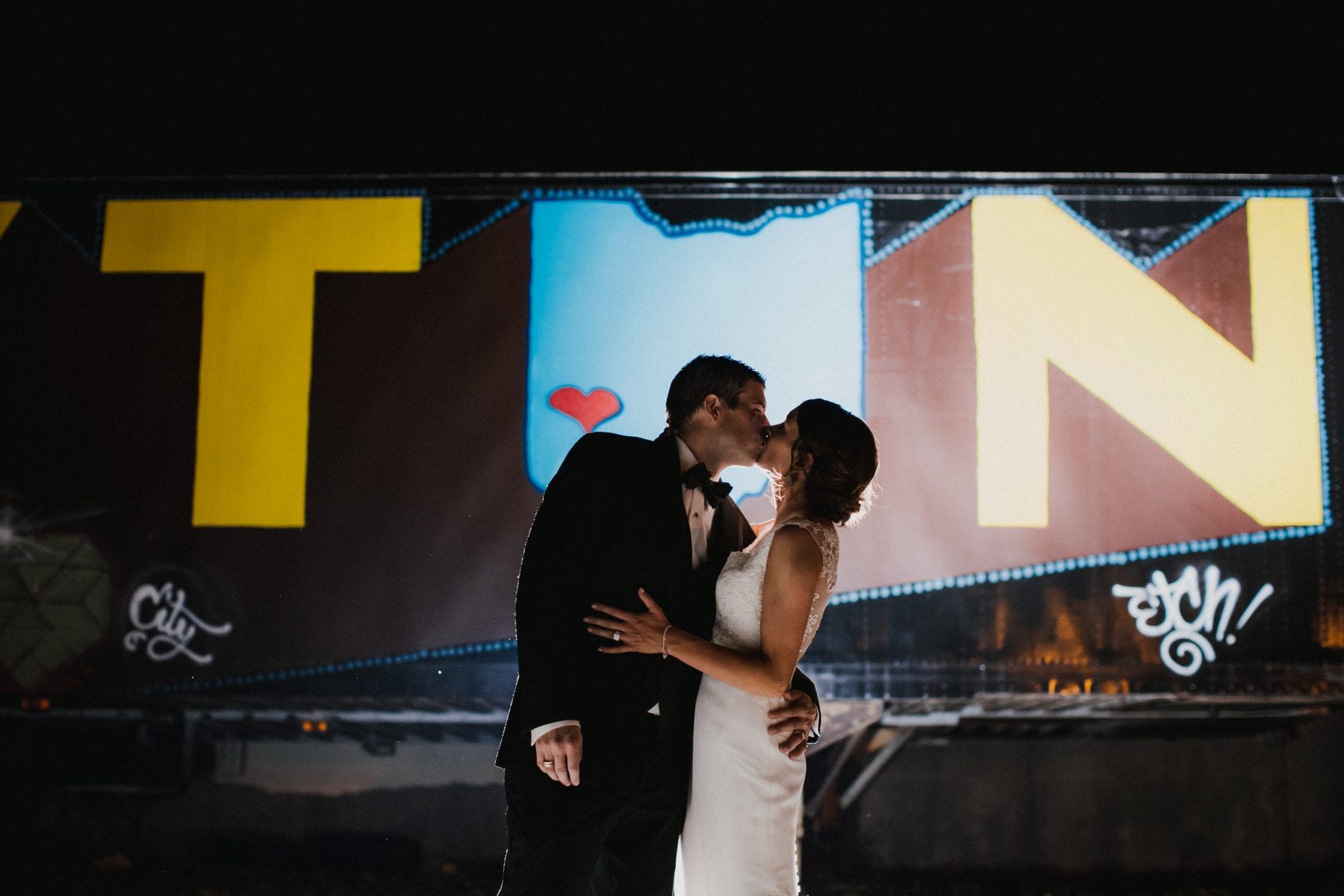 bride and groom kiss at Top of the Market Wedding - Dayton Wedding Photographer
