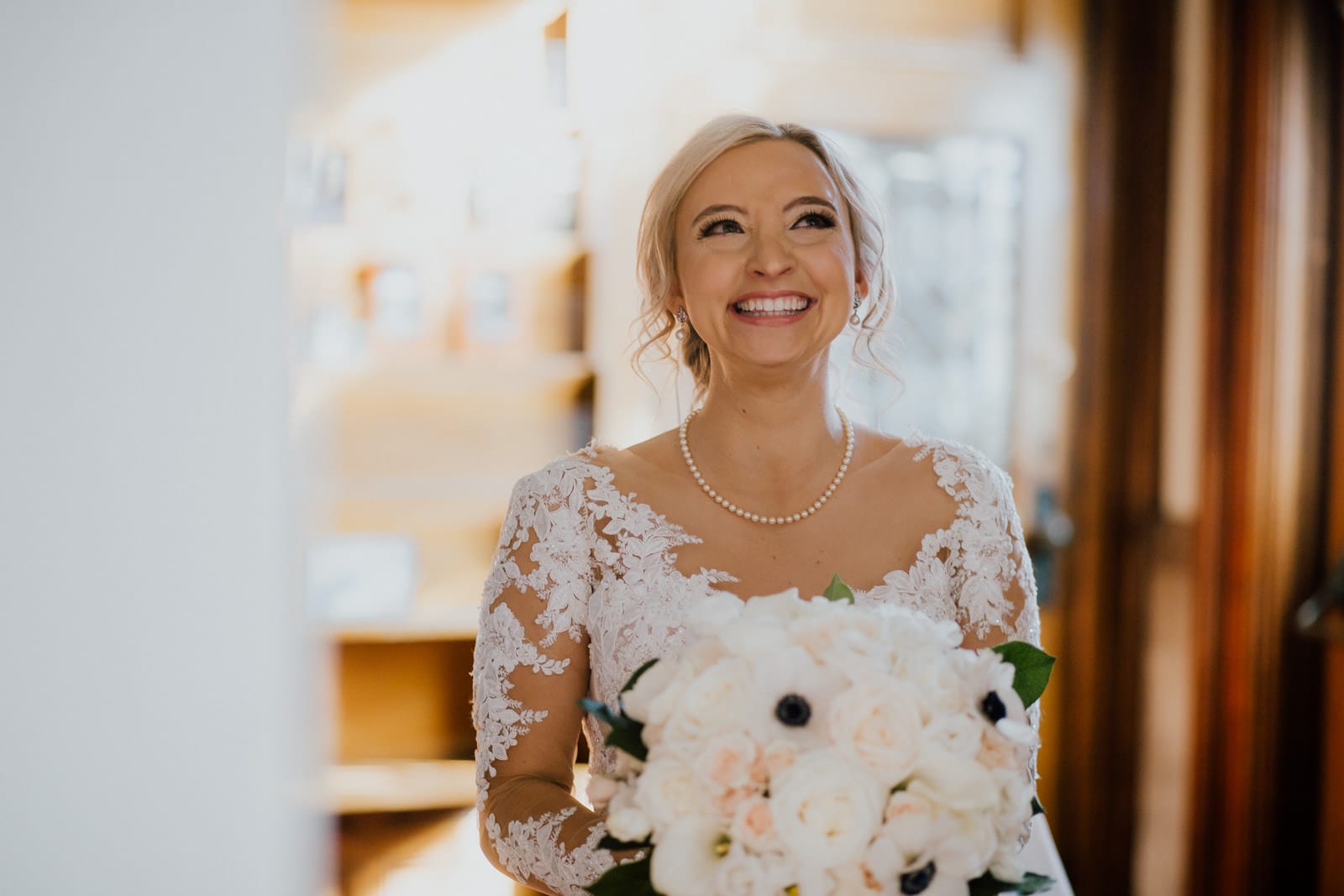 Bride smiles as she prepares to walk down the aisle