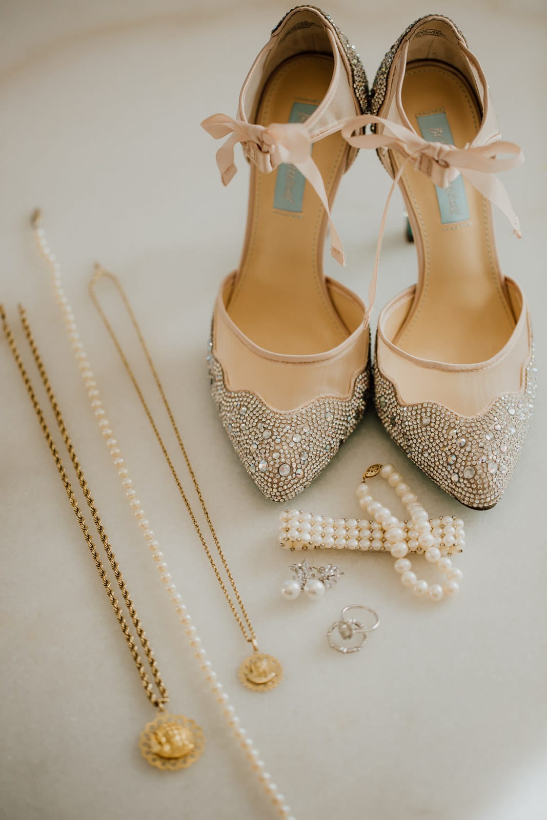 details of pearl wedding jewelry, religious items, shoes